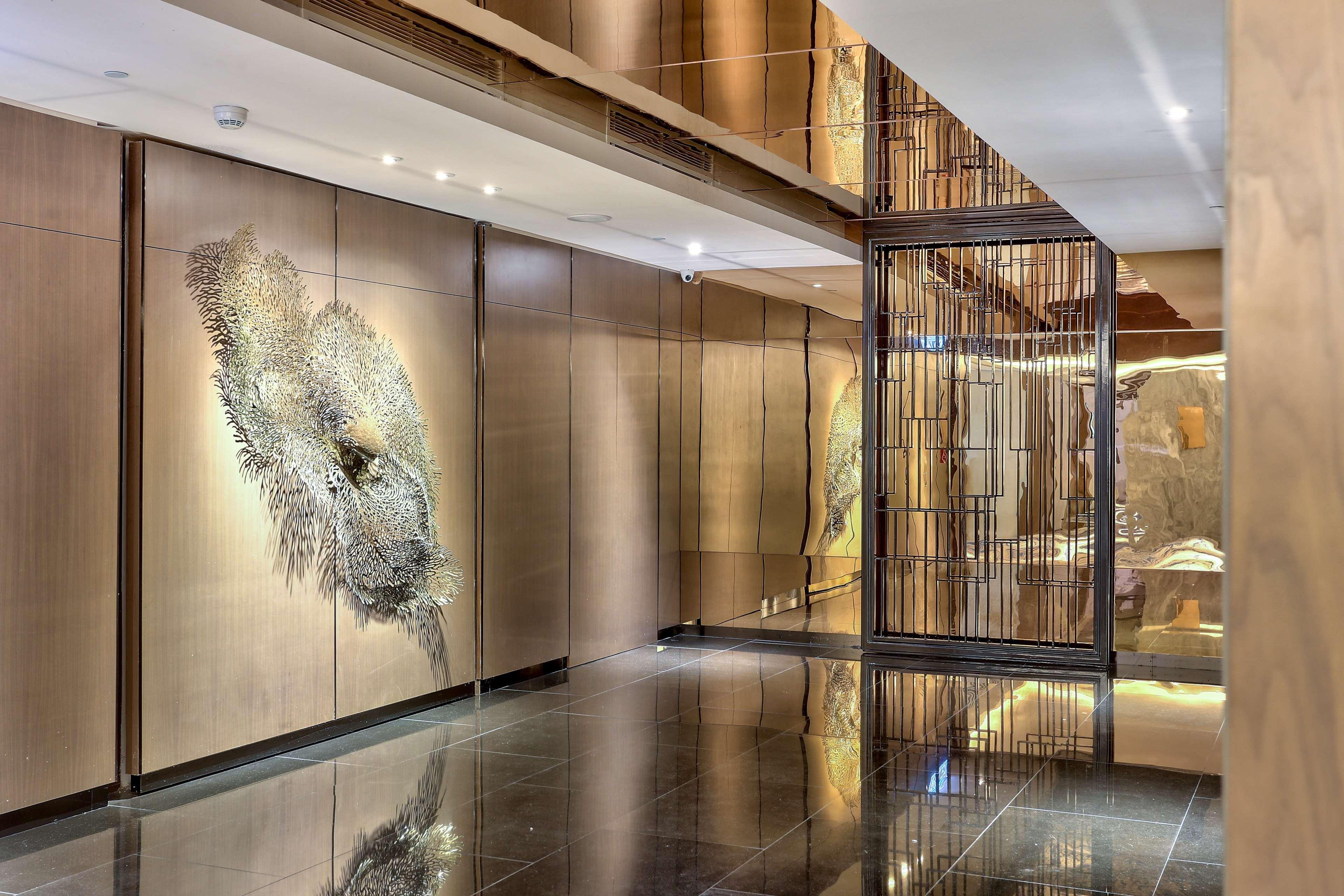 Hilton Kota Kinabalu Hotel Exterior foto The lobby of the Ritz-Carlton, DIFC